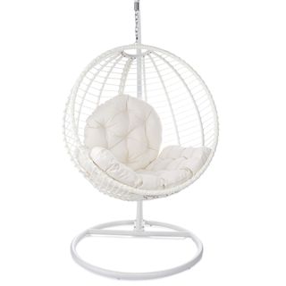 A white hanging wicker chair