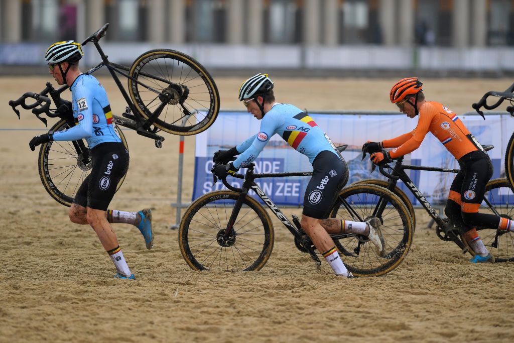 OOSTENDE BELGIUM JANUARY 30 Timo Kielich of Belgium Anton Ferdinande of Belgium and Mees Hendrikx of The Netherlands Beach during the 72nd UCI CycloCross World Championships Oostende 2021 Men U23 UCICX CXWorldCup Ostend2021 CX on January 30 2021 in Oostende Belgium Photo by Luc ClaessenGetty Images