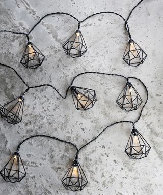 A set of black diamond fairy lights with warm LED lights by Lights4Fun