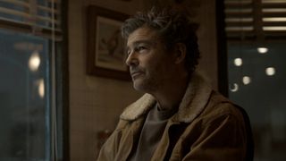 Kyle Chandler, in a brown jacket with fur collar, as Hal Jordan in the sixth episode "Bad Optics" of Lanterns (2026).