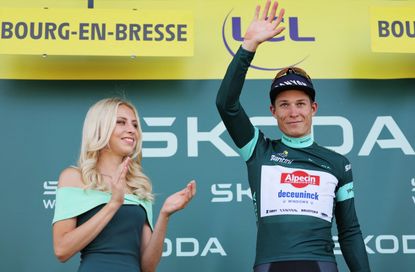 Jasper Philipsen receives the green jersey after finishing fourth on stage 18 of the 2023 Tour de France