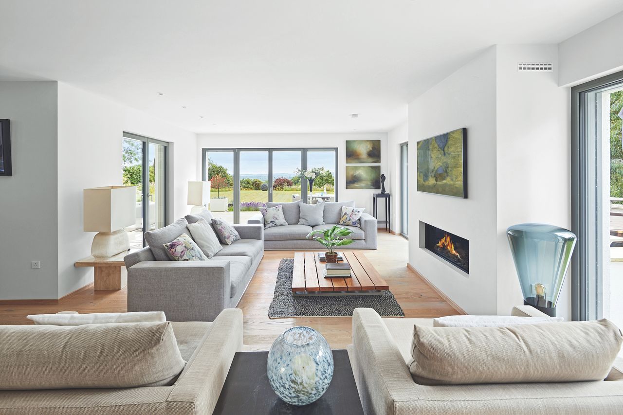 living room in kit house with bifold doors