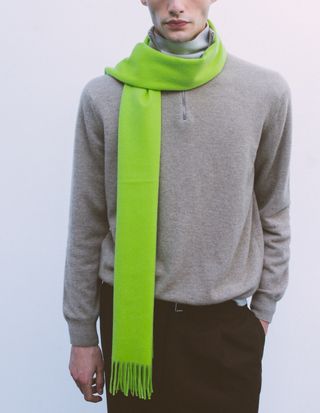 Begg & Co look with sweater and lime-green scarf