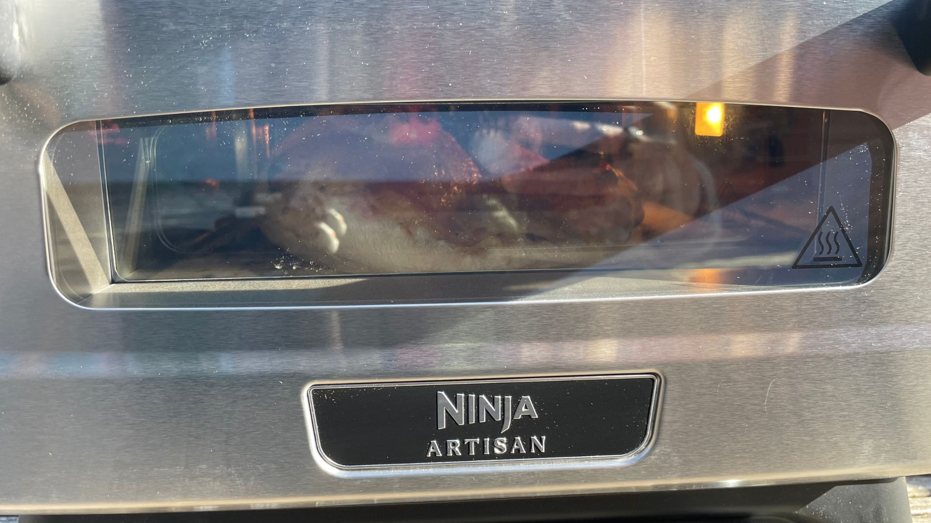 Ninja Artisan Electric Outdoor Pizza Oven and Air Fryer viewing window