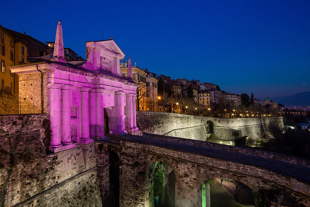 In Bergamo, the Porta San Giacomo of the upper city is lit up