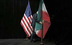 Iranian and US flags during the 2015 Vienna nuclear agreement signing ceremony
