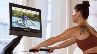 Woman exercising on the NordicTrack RW900