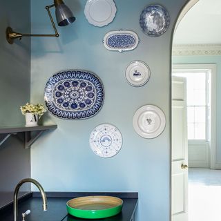 blue and white plates on wall