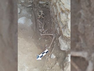 A 1,550-year-old "vampire burial" of a 10-year-old child was discovered in Italy.