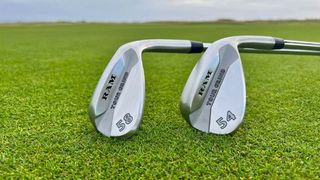 The excellent Ram Tour Grind Wedges resting on the green