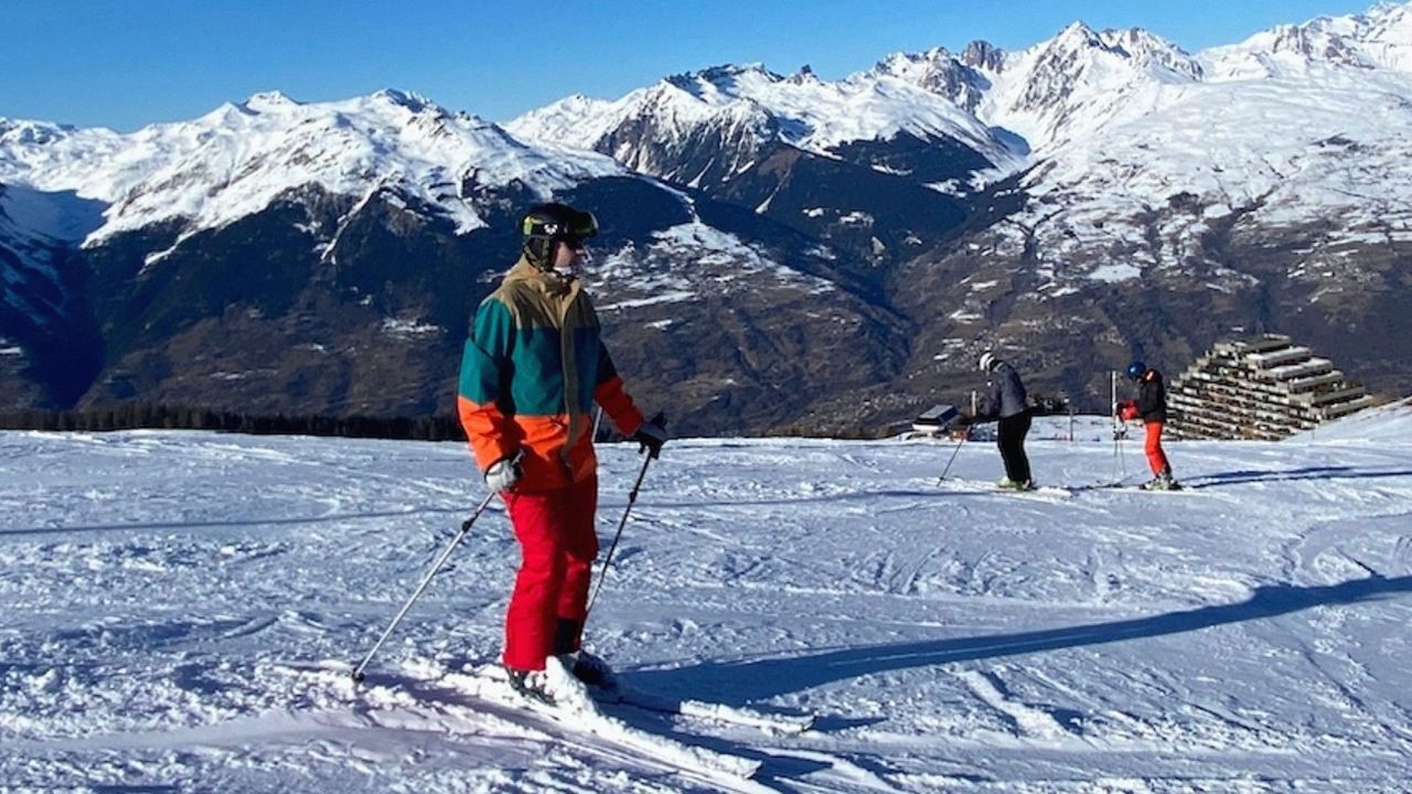 A person skiing in an Animal Arctic Mens Snow Jacket