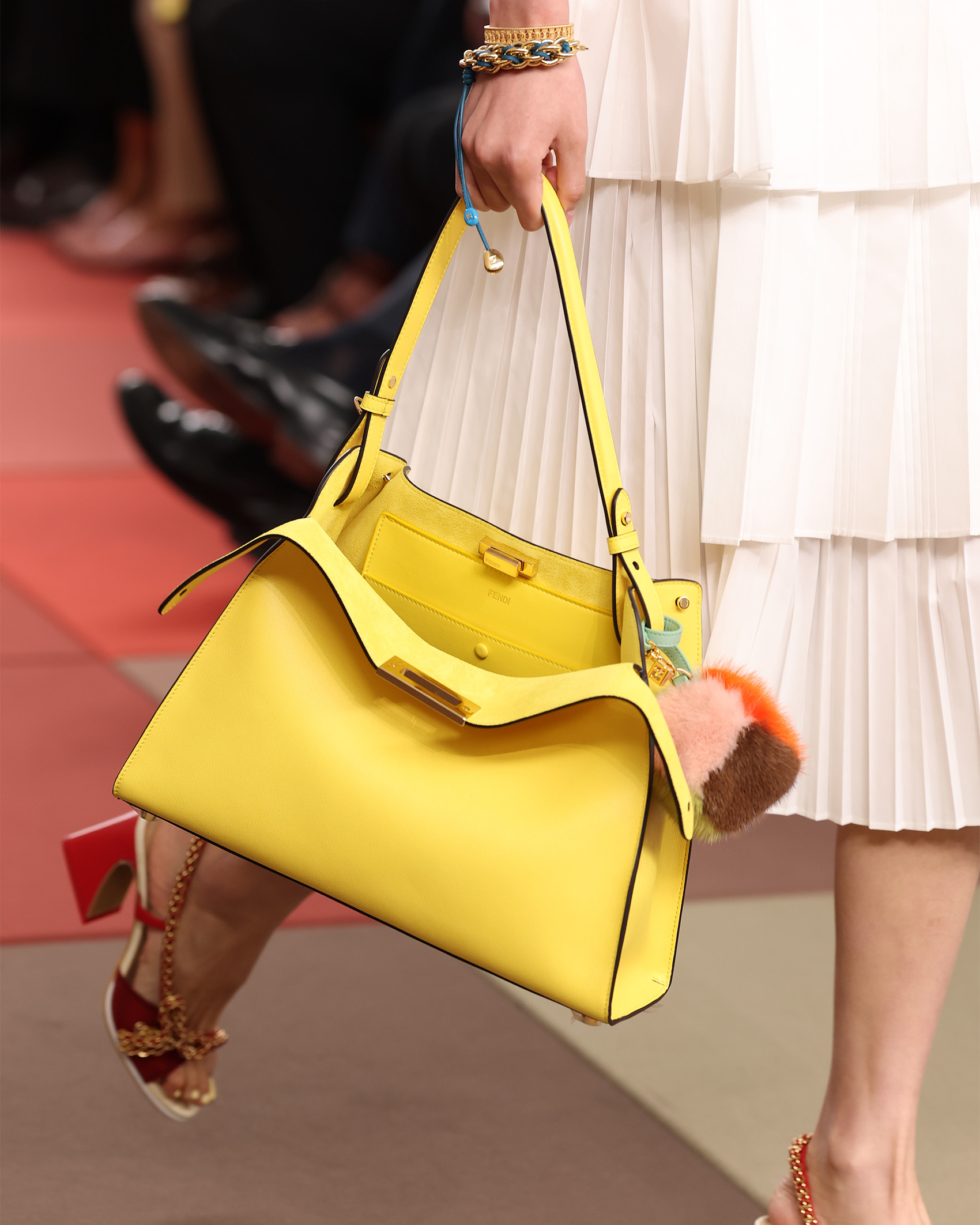 model holding Fendi bag