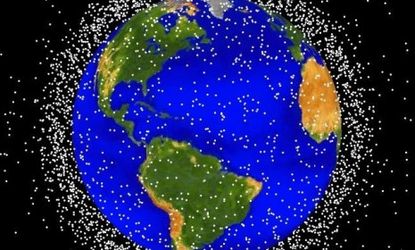 This computer generated graphic shows the build-up of tracked orbital debris, such as non-functional satellites, that currently orbits the Earth. 