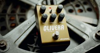 The Strymon Olivera is a five-knob stompbox in bronze-brown that offers an emulation of an oil-can delay
