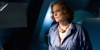 Avatar Sigourney Weaver deep in thought, in the lab