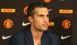 Robin van Persie of Manchester United speaks at a press conference after signing a four year contract with the club at Old Trafford on August 17, 2012 in Manchester, England.