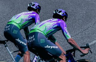 'Unexpected' pop of 'electric' green with purple flames featured in swap-out kits for Jayco AlUla for men's and women's Tour de France