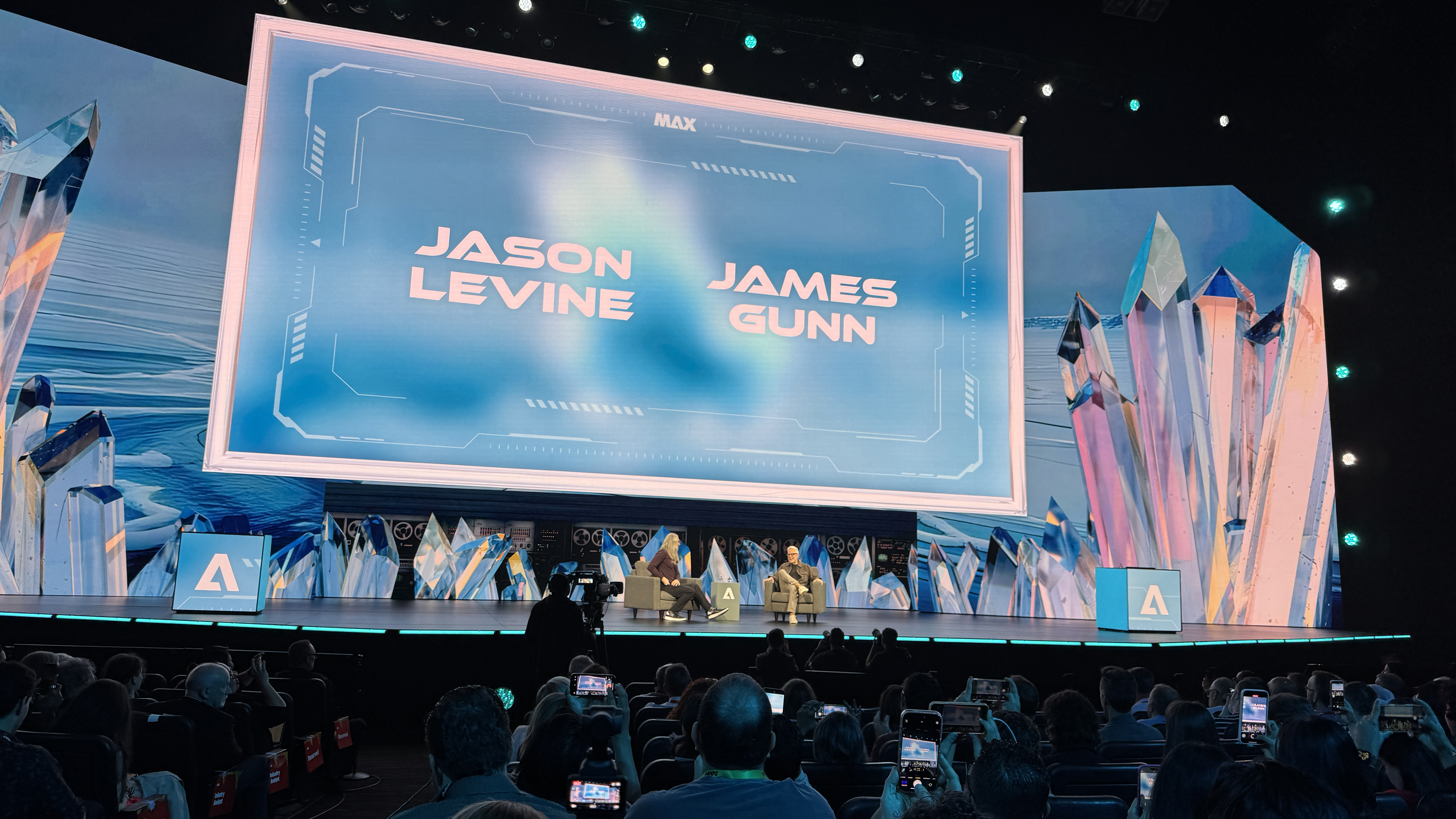 Jason Levine and James Gunn on stage at Adobe Max 2025 during the day two keynote