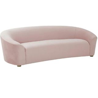 A pink velvet curved couch