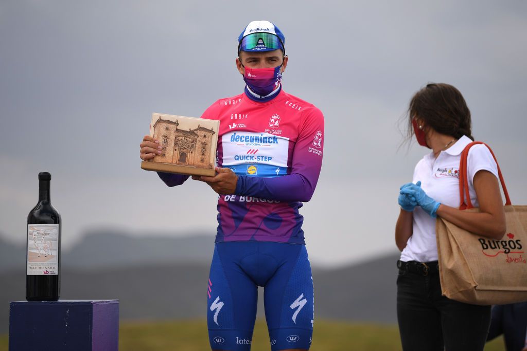 ESPINOSA DE LOS MONTEROS SPAIN JULY 30 Podium Remco Evenepoel of Belgium and Team Deceuninck QuickStep Purple Leader Jersey Celebration Trophy during the 42nd Vuelta a Burgos 2020 Stage 3 a 150km stage from Sargentes de la Lora to Espinosa de los Monteros Picn Blanco 1486m VueltaBurgos on July 30 2020 in Espinosa de Los Monteros Spain Photo by David RamosGetty Images