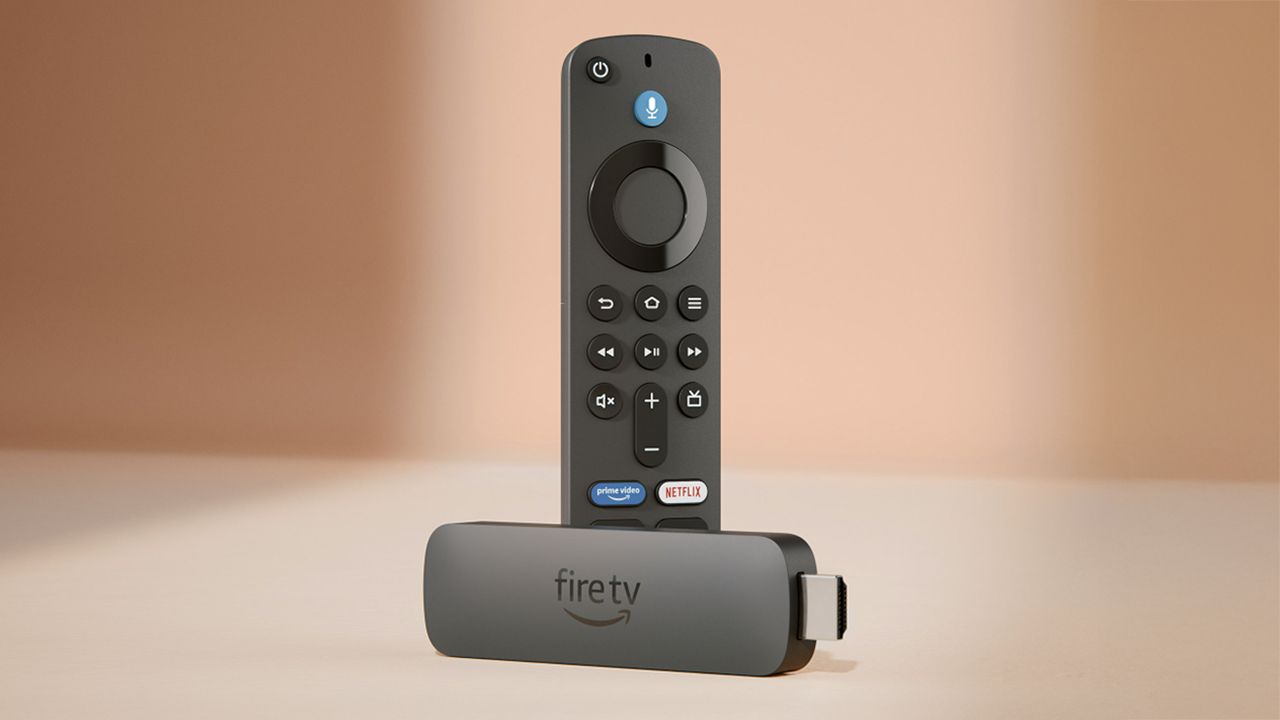 Amazon Fire TV Stick 4K Max on a beige backdrop (centred)