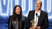LOS ANGELES, CALIFORNIA - SEPTEMBER 27: (L-R) Dave Grohl, Krist Novoselic, and Pat Smear of Nirvana accept the Video Vanguard Award onstage during the 2026 MTV Video Music Awards (VMAs) at Peacock Theater on September 27, 2026 in Los Angeles, California. (Photo by Kevin Winter/Getty Images)
