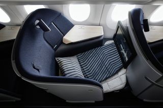 Finnair Business Class seating with striped cushion