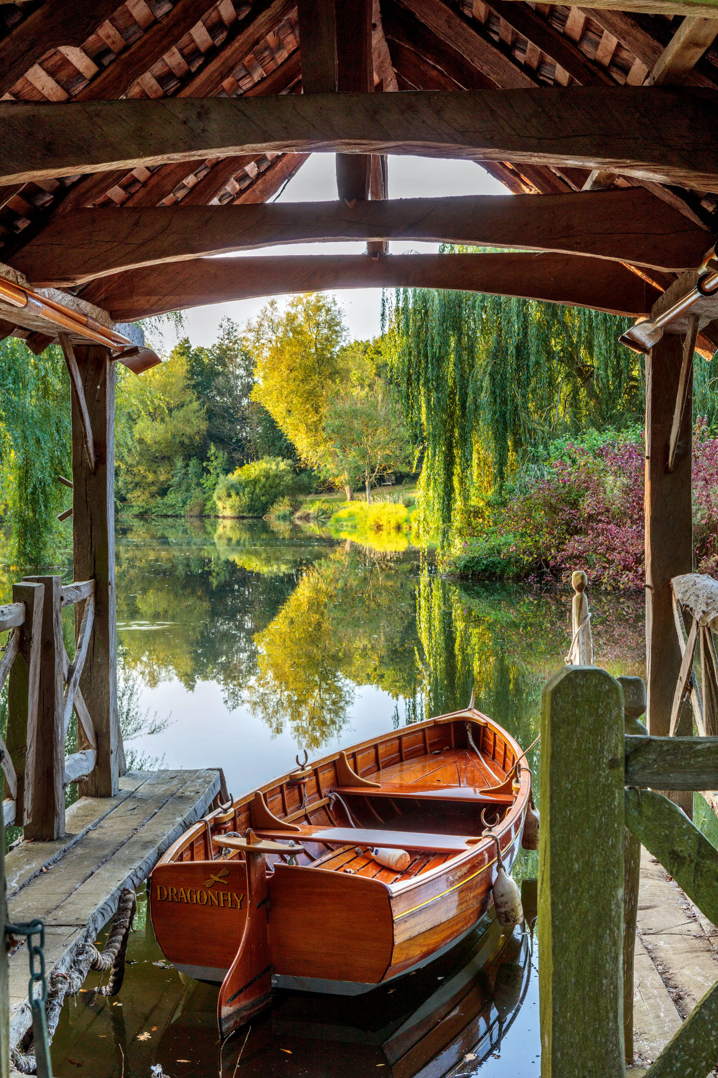 The Gardens at The Manor, Priors Marston, Warwickshire, photographed by Clive Nichols. Before Dragonfly could be launched, the lake had to be cleared of weeds and silt.