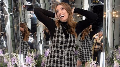 Stacey Solomon poses in a hall of mirrors
