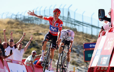 Enric Mas of Spain and Movistar Team - Red Leader Jersey celebrates at finish line as stage winner ahead of Oscar Onley of Great Britain and Netcompany INEOS Cycling Team 