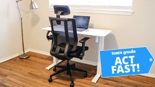 Vari Essential Electric Standing Desk with an Act Fast badge