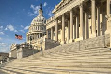 Detail view of the US Capitol east facade in the early morning sun