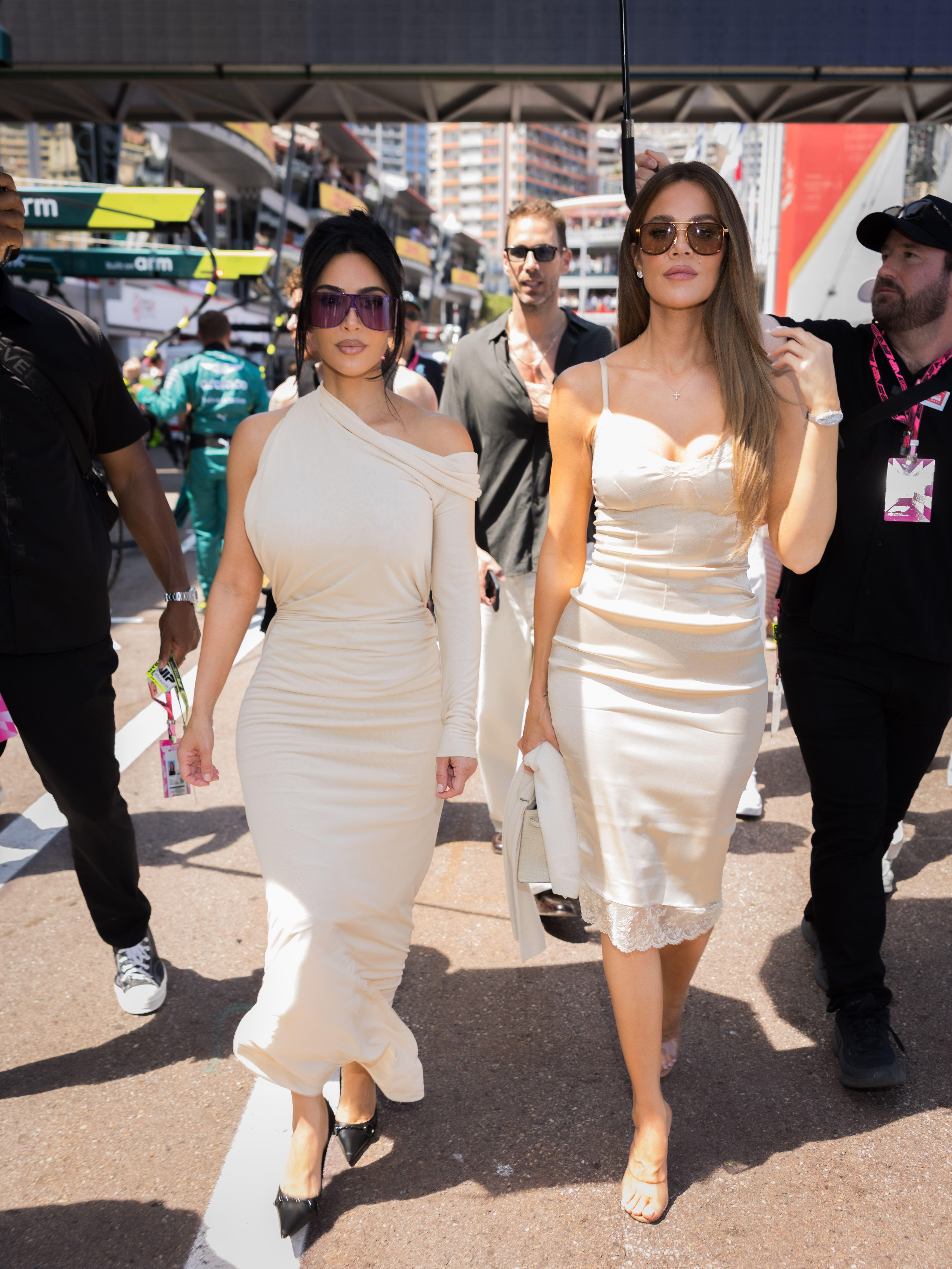 Kim and Khlo&amp;eacute; Kardashian twinned in ivory dresses at the Formula 1 Monaco Grand Prix