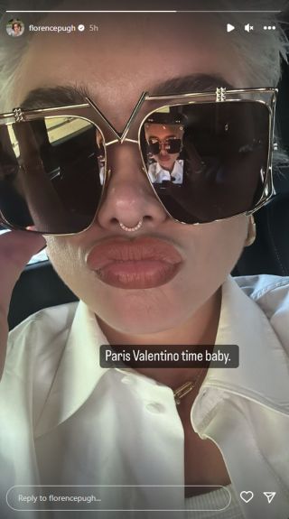 Florence Pugh took a selfie of her wearing a big pair of sunglasses.