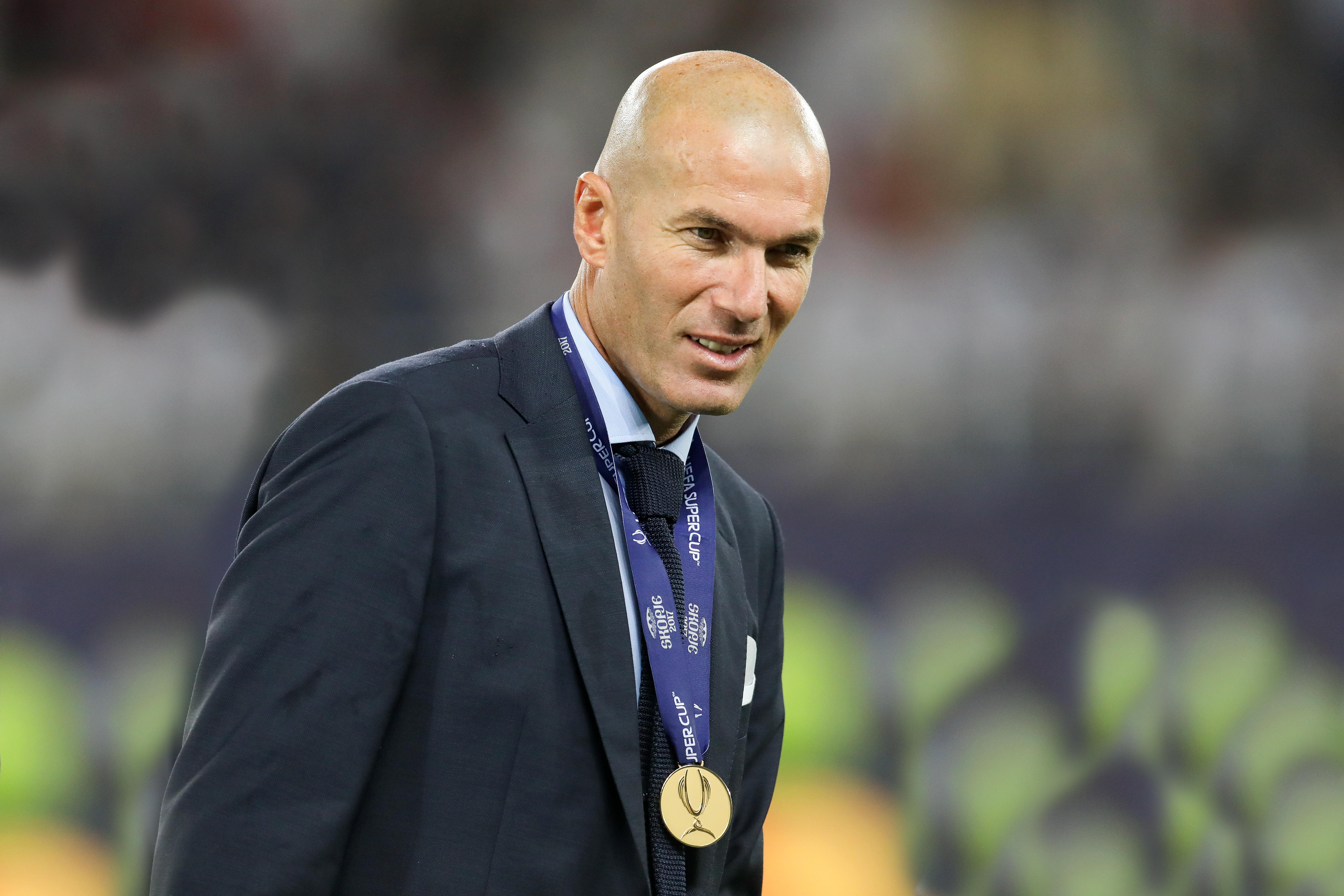 Real Madrid manager Zinedine Zidane with a medal around his neck after Real Madrid beat Manchester United to win the 2017 UEFA Super Cup