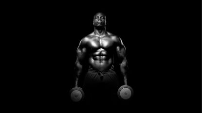 Muscular person holdiong dumbbells in his hands