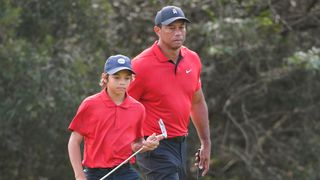 Charlie Woods and Tiger Woods during the 2021 PNC Championship at Ritz-Carlton Golf Club
