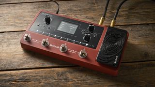 Mooer GE150 Pro li on wooden floor