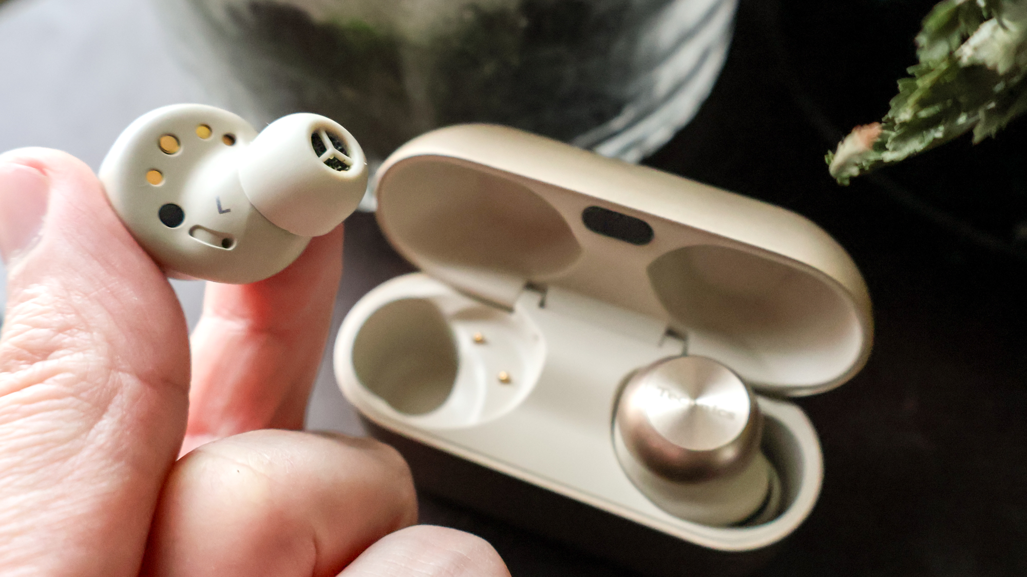 A Technics EAH-AZ100 Wireless Earbud in an ear