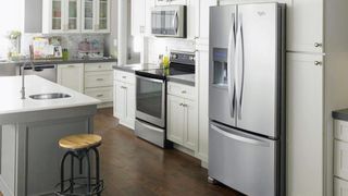 Whirlpool WRF555SDFZ 24.7 Cu. Ft. French Door Refrigerator pictured in kitchen