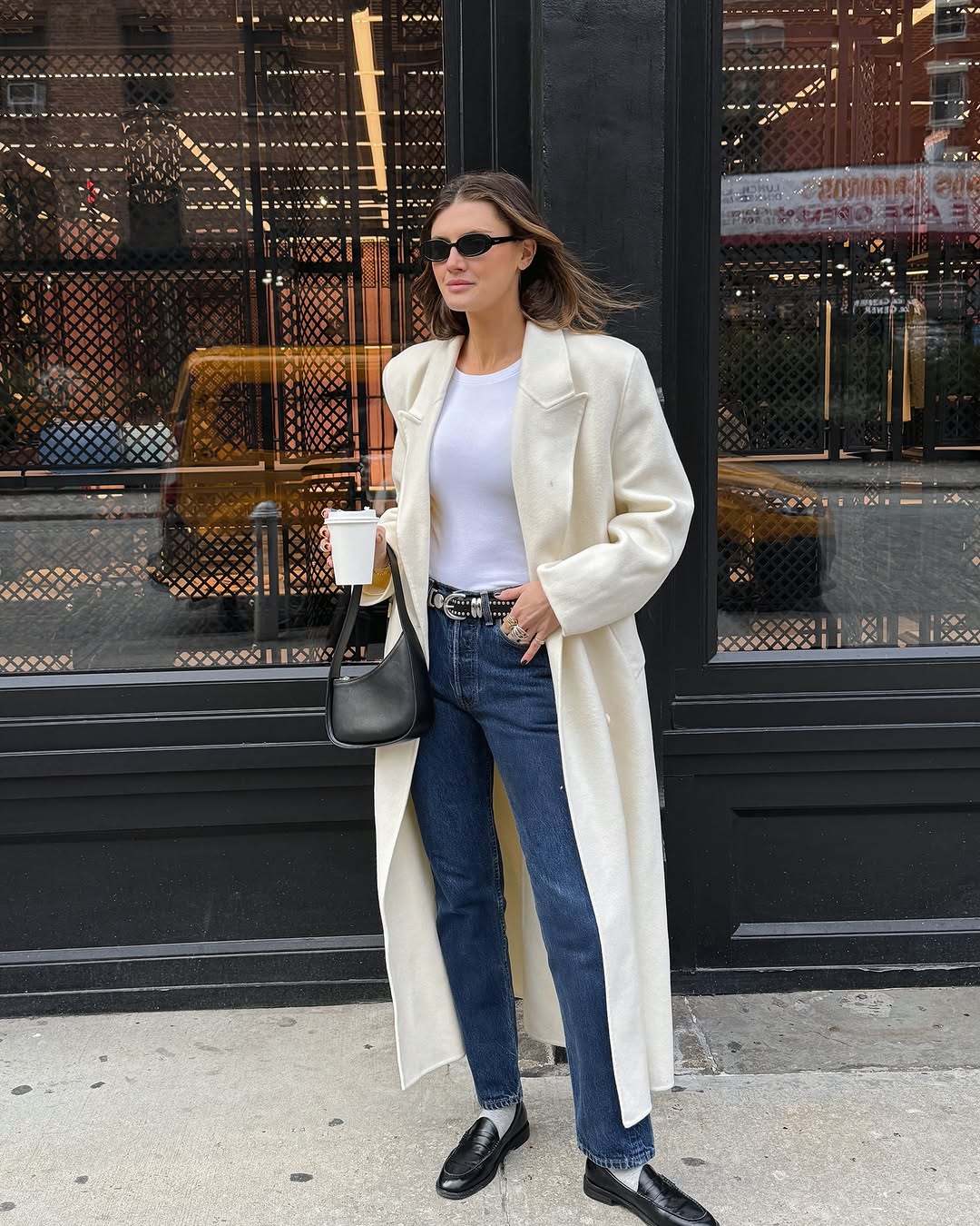 woman wearing winter to spring transitional capsule wardrobe 2026