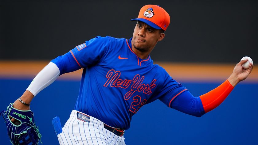 The New York Mets’ Juan Soto prepares to throw a ball