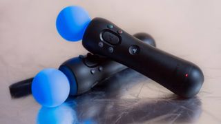 A pair of PlayStation Move controllers