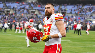 Travis Kelce #87 of the Kansas City Chiefs warms up prior to the AFC Championship NFL football game against the Baltimore Ravens at M&T Bank Stadium on January 28, 2024