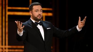 Host Jason Manford on-stage during the 2022 Olivier Awards at London's Royal Albert Hall on April 10, 2022.