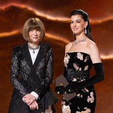 Anna Wintour and Anne Hathaway on stage at the 2026 Oscars
