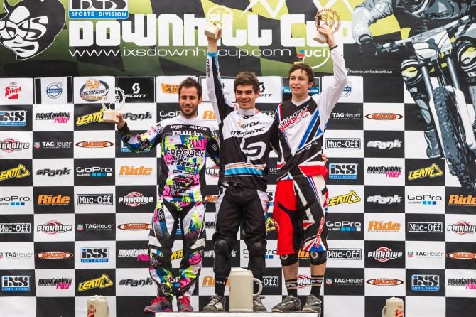 Elite men's iXS downhill podium in Leogang