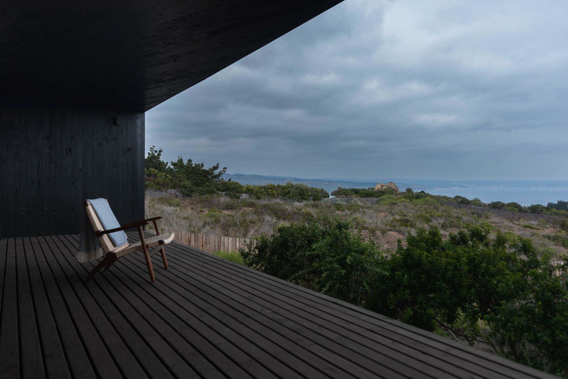 Casa Asomada by Whale!, a chilean house jutting out from a cliff towards the landscape