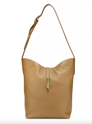 a liffner penne bucket bag in front of a plain backdrop