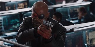 Nick Fury holding gun in The Avengers